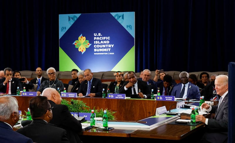 President Joe Biden, right, meets with presidents of Pacific island nations at the U.S.-Pacific Island Country Summit in Washington, D.C., Sept. 29, 2022.