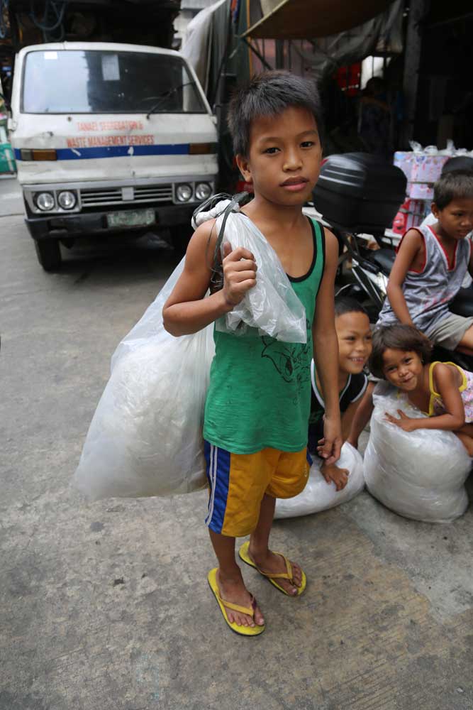 50 years of US patronage did not solve the poverty that afflicts many Filipinos. Duterte is betting that build, build, build with China will give these children a brighter future.  Photo: RFA
