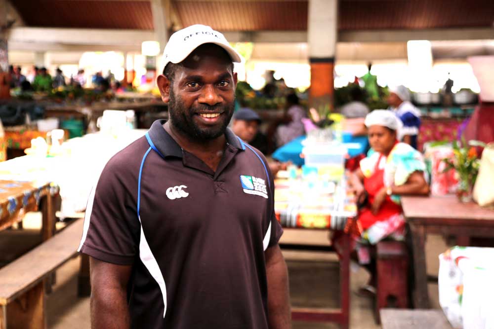Reuben is a local business owner at Port Vila markets. Local businesses are becoming increasingly rare in Port Vila where increasingly shops and restaurants are Chinese-owned. Photo: RFA